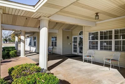 Entrance of Chisholm Court with covered porch area
