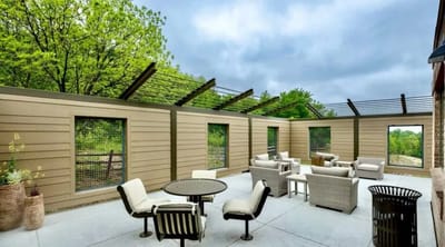 Outdoor seating area with greenery
