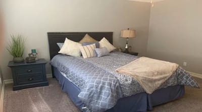 Cozy private bedroom with a comfortable bed and decor