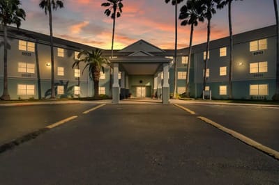 Exterior view of Cimarron Estates at sunset