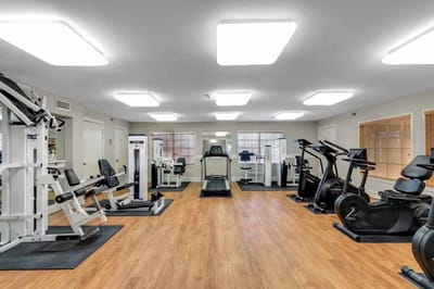 Well-equipped fitness room with exercise machines