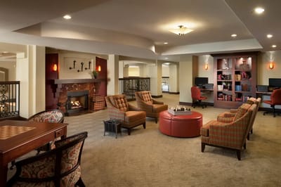Cozy common area with seating and chess table