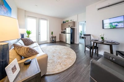 Cozy resident living space with kitchen and seating area
