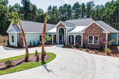 Exterior view of Coastal Cove of Wilmington with landscaping