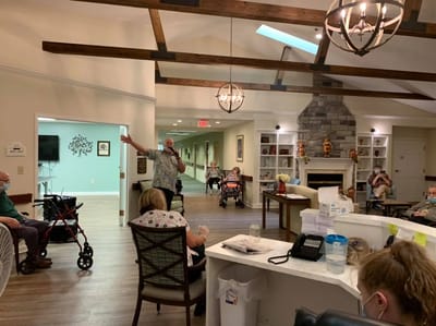 Residents enjoying a group activity in the common area