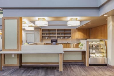 A modern interior lobby with reception area