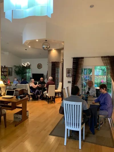 Residents socializing in a bright common area