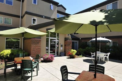 Outdoor seating area at Conservatory Place Senior Living Apartments