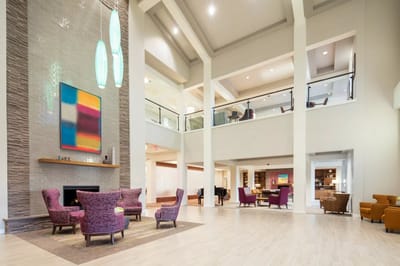 Modern lobby area with seating and artwork