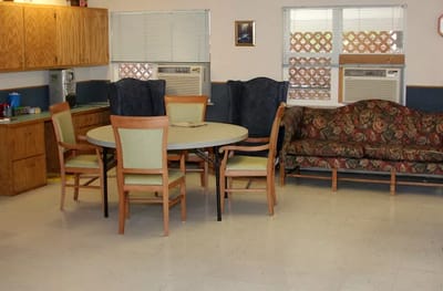 Dining area with a round table and chairs