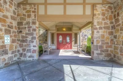 Entrance of the facility with stone architecture