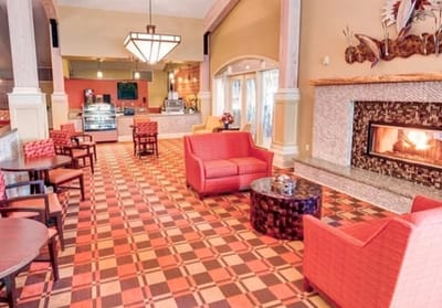 Cozy common area with a fireplace and seating