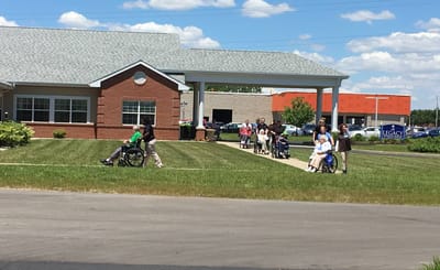 Residents and staff enjoying the outdoor space