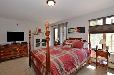 Cozy private resident room with a bed and TV