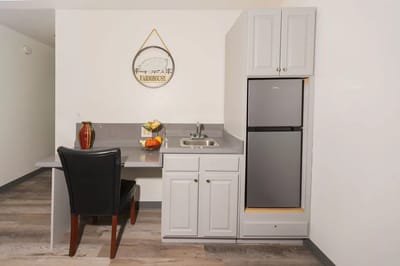 Well-equipped kitchen area in a resident unit