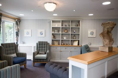 Bright common area with seating and artwork