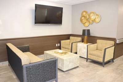 Interior common area with seating and TV