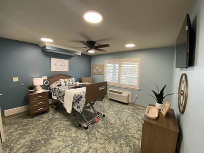 Private resident room with modern decor and bed