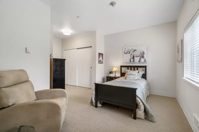 Cozy private resident room with warm decor