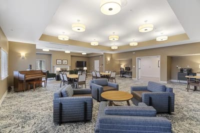 Interior common area with seating and piano