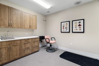 Interior room with cabinets and wall art