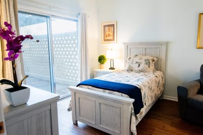 Cozy resident room with a bed and decor
