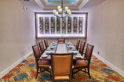Elegant dining room setup with wooden table and chairs