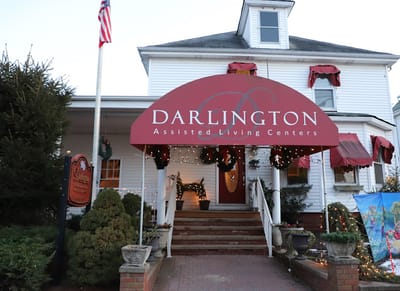 Front entrance of Darlington Assisted Living with holiday decorations