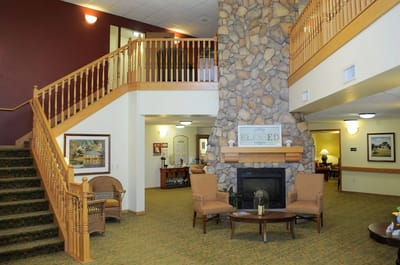 Welcoming common area with seating and fireplace