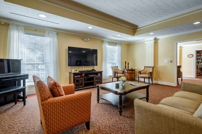 Cozy common area with seating and a television
