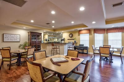Interior view of a dining area with tables and chairs