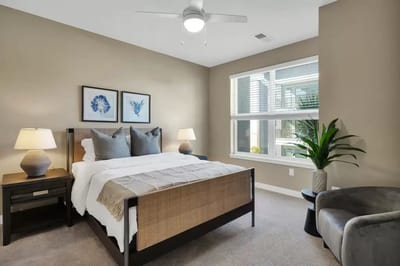 Bright, well-furnished resident room with natural light