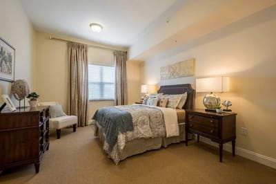 Cozy private resident room with a bed and decor