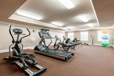 Fitness center with exercise equipment and workout machines