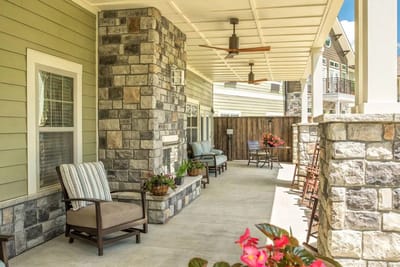 Relaxing outdoor seating area with stone accents