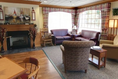 Cozy common area with comfortable seating and a fireplace
