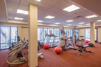Interior view of a fitness room with exercise equipment