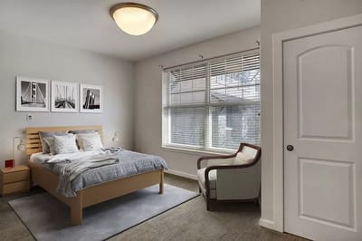 A well-furnished private resident room with natural light