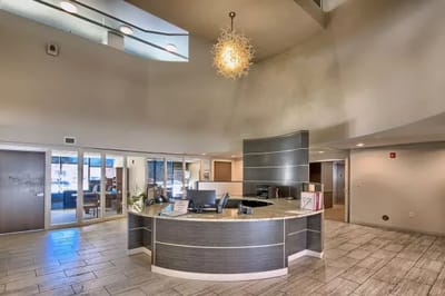 Modern reception area with elegant decor and seating
