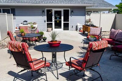 Outdoor seating area with chairs and tables