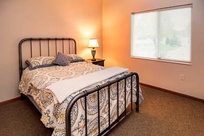 Cozy bedroom with a bed and window