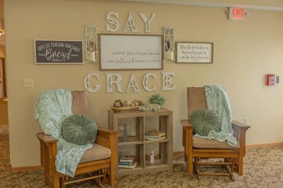 Cozy seating area decorated with inspirational signs