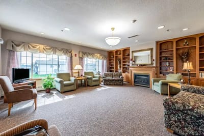 Cozy common area with seating and a fireplace