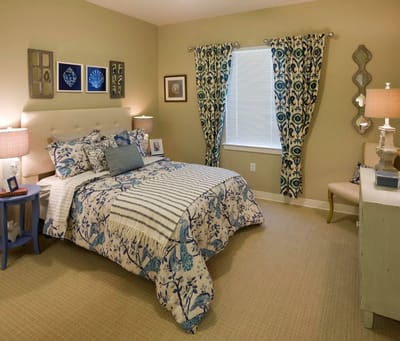 A well-decorated private resident room with floral design