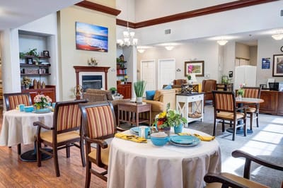 Bright dining area with tables and seating