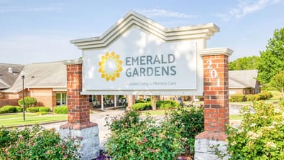 Exterior sign of Emerald Gardens Assisted Living facility