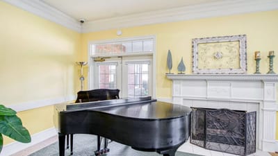 Interior view of a piano in a sunny lounge area