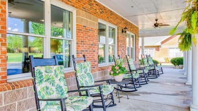 Cozy outdoor seating area with rocking chairs