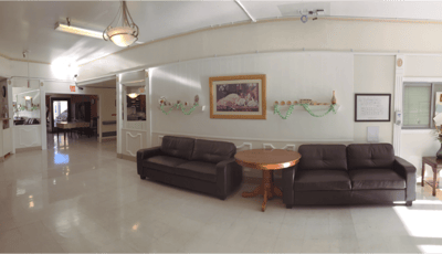 Common area with couches and a table in the facility