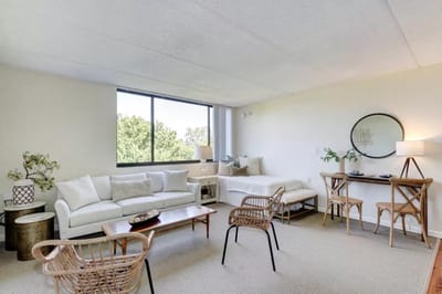 Brightly lit common area with modern furniture
